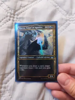 MTG Queza, Augur of Agonies (Showcase) Streets of New Capenna Foil 326 U - Image 1