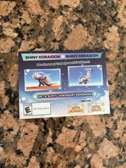 Pokemon Scarlet and Violet Shiny Koraidon OR Miraidon Gamestop Promo Code Card - Image 1
