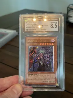 Yugioh! Vampire's Curse Ultimate PTDN-EN090 1st Edition CGC 8.5 NM Euro Print - Image 1