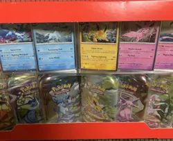 Pokemon TCG: Scarlet & Violet - Prismatic Evolutions 8 Pack Mini Tin Set Costco - Image 3