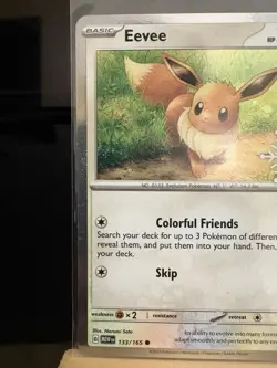 EEVEE - 133/165 Holiday Calendar Stamped Cosmos Holo Common - Pokemon TCG Card - Image 2