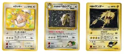 LOT OF THREE (3) VINTAGE JAPANESE POKEMON CARDS (2 HOLO RARE) - Image 1