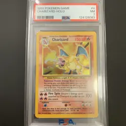 1999 POKEMON BASE SET UNLIMITED #4 CHARIZARD-HOLO PSA 7 - Image 1