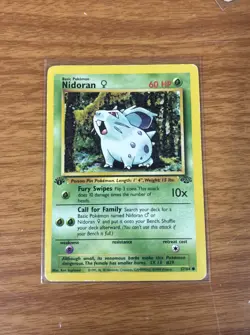 NM/EX + RAW Pokemon Card 1st Edition Nidoran 57/64 Jungle COMMON - Image 1