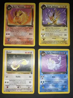 Pokemon TCG Dark Jolteon, Dark Flareon, Dark Vaporeon & Eevee Team Rocket LP - Image 1