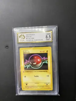 Pokemon Card Voltorb 67/102 1st Edition Base Set Shadowless Near Mint. CGA 8.5 - Image 1