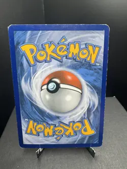 Pokemon TCG Sun & Moon Rockruff SM06 Cosmos Holo Black Star Promo HP - Image 2