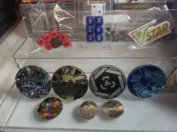 Lot Of Dice And Pokemon Coins Etc - Image 1