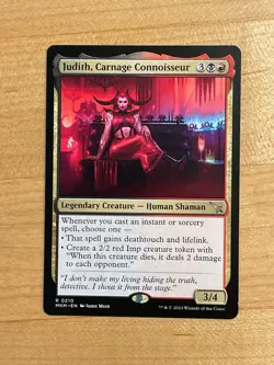 MTG NM Judith, Carnage Connoisseur [Murders at Karlov Manor] - Image 1