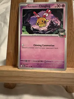 Team Rocket's Chingling 085/182 Common Regular Pokemon TCG - Image 1