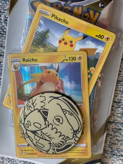 POKEMON TCG SWORD & SHIELD BRILLIANT STARS PACK, PIKACHU & RAICHU CARD, COIN - Image 3