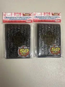 (100)YUGIOH Small Sized Millenium Puzzle Card Sleeves Black (2x 50packs) Tracked - Image 1