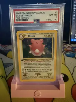 Pokemon 1st Edition Blissey 02/64 Neo Revelation Holo PSA 8 - Image 1