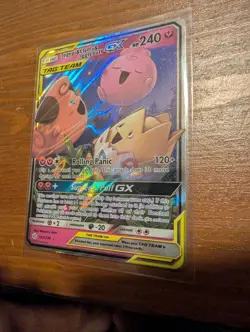 Pokemon English TCG Card Cosmic Eclipse Togepi Cleffa Igglybuff GX 143/236 Holo - Image 1
