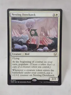1x Nesting Dovehawk NM-Mint, English Commander: March of the Machine MTG Magic - Image 1