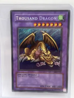 YUGIOH THOUSAND DRAGON MRD-143 SECRET PLAYED/EDGE WEAR - Image 1