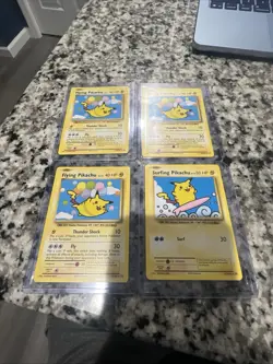 Pokemon Evolutions Flying Pikachu & Surfing Pikachu 4x Cards - Image 1