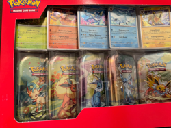Pokemon TCG: Scarlet & Violet - Prismatic Evolutions 8 Pack Mini Tin Set Costco - Image 3