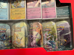 Pokemon TCG: Scarlet & Violet - Prismatic Evolutions 8 Pack Mini Tin Set Costco - Image 4