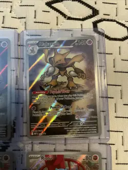 Pokemon Center Alakazam 009 & Riolu 010 Mega Evolutions Regular & Stamped Set - Image 3