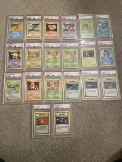 Lot of 20 PSA 8 Graded Pokemon 1st Edition Cards - Image 1