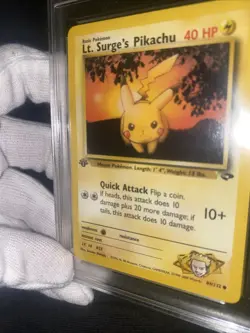 Lt. Surge's Pikachu 84/132 First Edition GRADED 10 NEAR MINT PGC Pokemon Card - Image 1