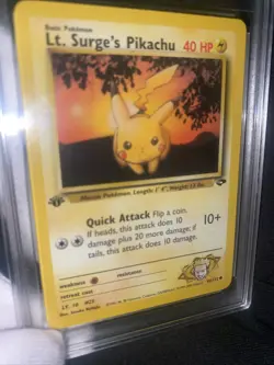 Lt. Surge's Pikachu 84/132 First Edition GRADED 10 NEAR MINT PGC Pokemon Card - Image 3