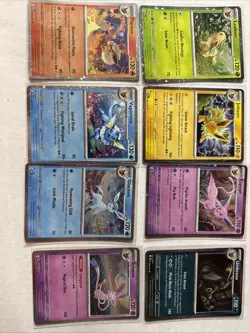 Prismatic Evolutions Costco 8 Mini Tin Cosmos Promo Cards SET - Image 1