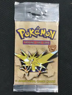 Pokemon Unopened Fossil Booster Pack 11 Cards Factory Sealed 1999 (1 Pack) - Image 1