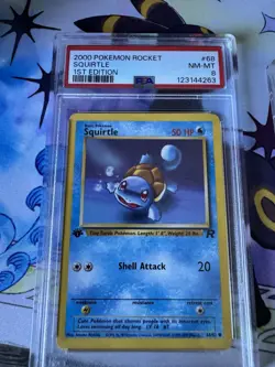 Pokemon Squirtle 1st Edition Team Rockets Series 68 PSA 8 - Image 1