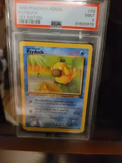 1st Edition 1999 Pokemon Fossil Psyduck PSA grade 9 - Image 1