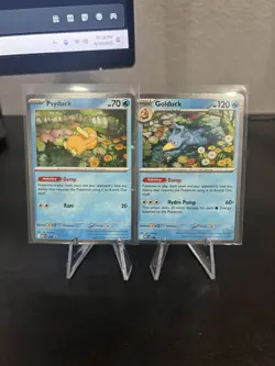 Pokemon TCG Mega Evolutions Psyduck 007 - Golduck 008 Black Star Promo - Image 1
