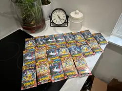 Pokemon TCG Surging Sparks Booster Pack Lot of 20-New/Factory Sealed - Image 1