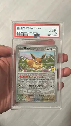 Eevee Prismatic Evolutions 074/131 Holo Pokemon Day 2025 Stamped Promo PSA 10 - Image 1