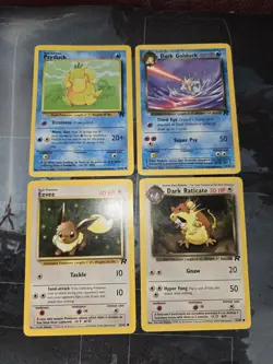 4-Card Team Rocket Set Pokemon Lot, Eevee, Psyduck, Golduck, Dark Raticate - Image 1