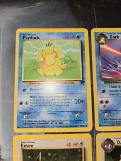 4-Card Team Rocket Set Pokemon Lot, Eevee, Psyduck, Golduck, Dark Raticate - Image 4