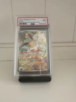 Pokemon TCG Eevee 173 Promo Prismatic Evolutions Holo Card PSA 9 - Image 1