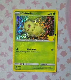 LIGHT HOLO BLEED ERROR Chikorita 2/25 Holo McDonalds 25th Anniversary Pokemon - Image 1