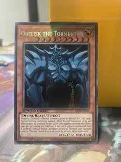 yugioh MISPRINT Obelisk the Tormentor SBCB-EN202 NM 1st edition Secret Rare - Image 1
