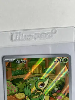 Pokemon TCG Snivy Reverse Holo with Vine Whip attack. Card features bright... - Image 2