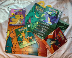 8 UNOPENED Pokemon Card Packs 2025 McDonald’s Happy Meal + 4 Empty Meal Boxes - Image 1