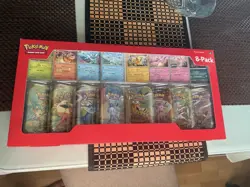 Pokemon Prismatic Evolutions 8 Mini-Tins with Promo Cards Sealed - Image 1