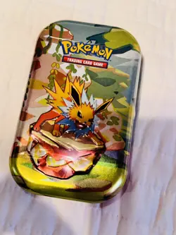 Pokemon TCG: Scarlet & Violet Prismatic Evolutions Jolteon Mini Tin Sealed - Image 1