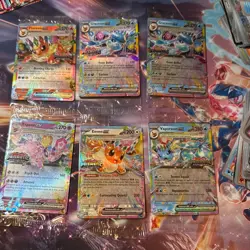 Prismatic Evolutions Surprise Box Sealed Stamped EX Promo Cards - Image 1