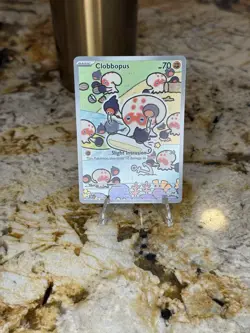 Pokemon TCG Clobbopus Holo Illustration Rare Card SV08 Surging Sparks 207/191 - Image 1