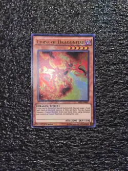 Yugioh! Curse of Dragonfire MIL1-EN002 Ultra Rare 1st Edition Light Play - Image 1