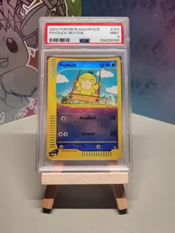 Pokemon PSA 9 Mint Aquapolis Psyduck Reverse Holo 104/147 - Image 1