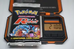 21.00g Pokemon Team Rocket Unlimited Booster Pack Factory Sealed WOTC 2000 - Image 1