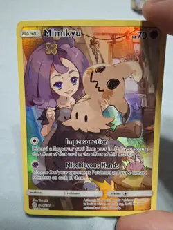 Mimikyu Pokemon Trading Card - Basic, HP 70, Holo Rare Cosmic Eclipse - Image 1