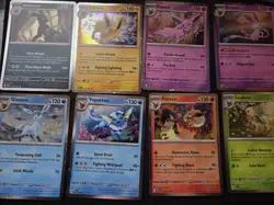 Pokemon Prismatic Evolutions Costco Mini Tins Cosmo Promo Cards (8 Cards Total) - Image 1